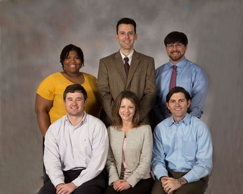 Staff members of the Psychiatry Outreach Program are, front row, from left, row, co-founders Dr. Matthew Walker, a third-year resident; Dr. Chasity Torrence, assistant professor of psychiatry; and fourth-year resident Dr. Charles Richardson; back row, from left, volunteers Yolonda Ross, a fourth-year medical student; Dr. Jon Jackson, assistant professor of psychiatry; and Jonathan Baker, a fourth-year medical student.